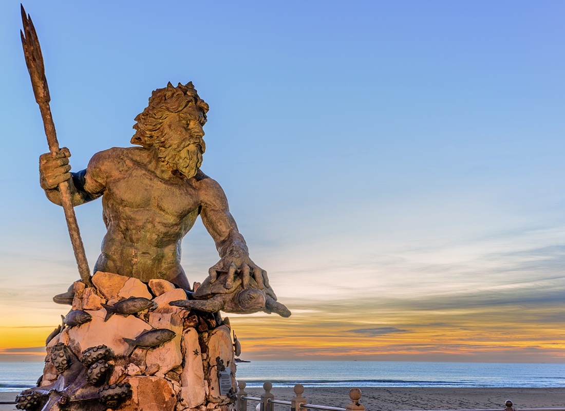 Blog - Statue of King Neptune at Neptune Park, Virginia Beach During Sunset